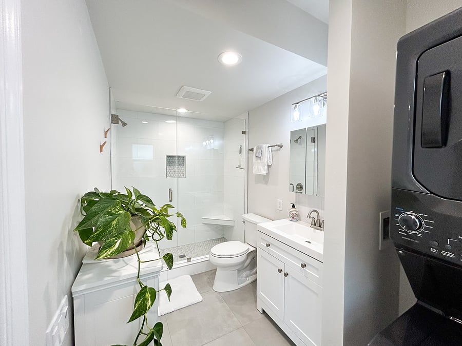 Beautiful glass-doored shower retreat.