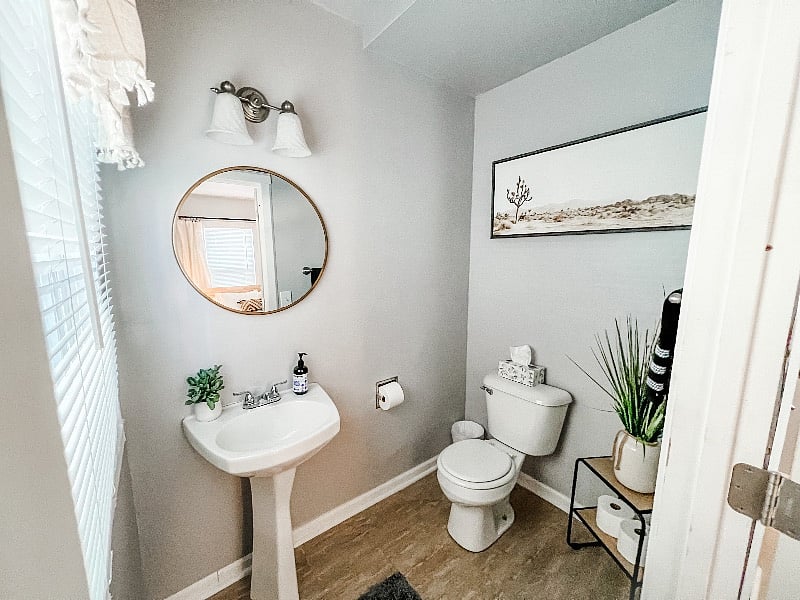 Half bathroom en suite connected to downstairs master bedroom!