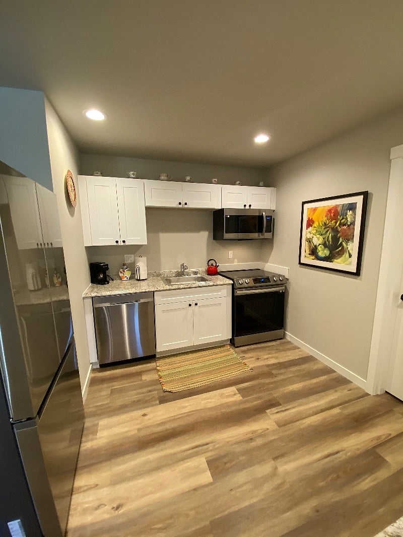 Full size kitchen. Dishwasher, range, stove with air fry, microwave