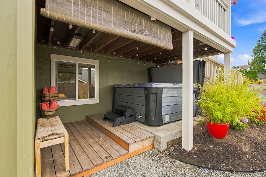 Hot tub sits outside your door. Complete with full body massaging jets and miracle bubbles. Relax, unwind in bliss!
