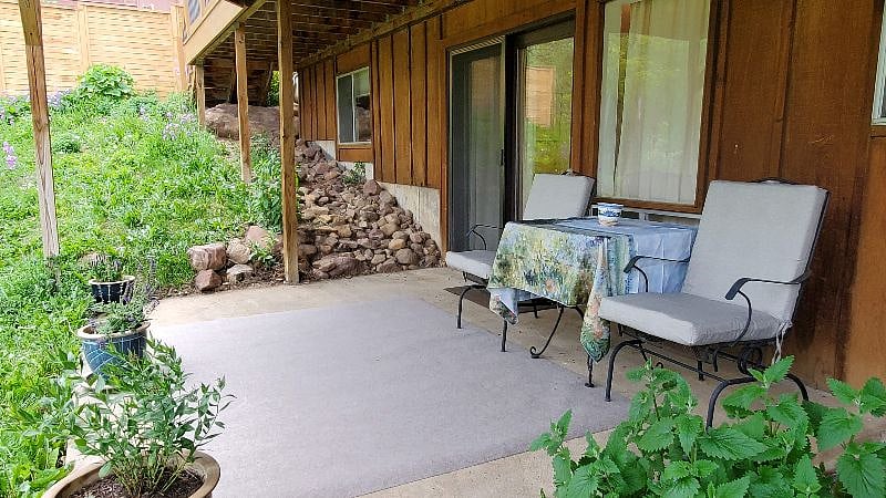 Private Patio overlooking Spring Brook Gardens