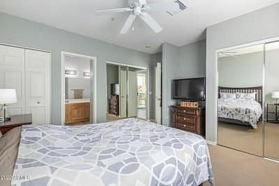 Larger bedroom with view of golf course
