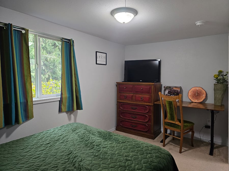 #2 Bedroom TV and dresser.