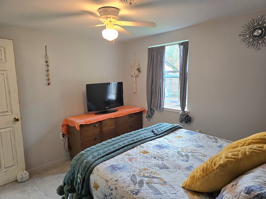 #1 bedrooms TV and dresser.