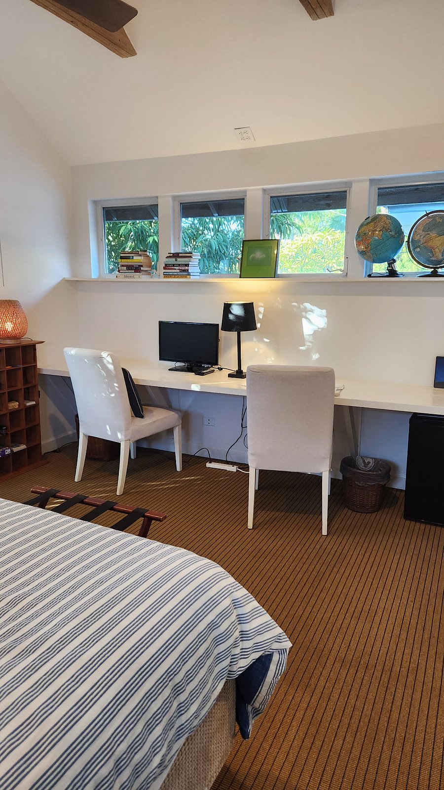 built in desk countertop and window bookshelf