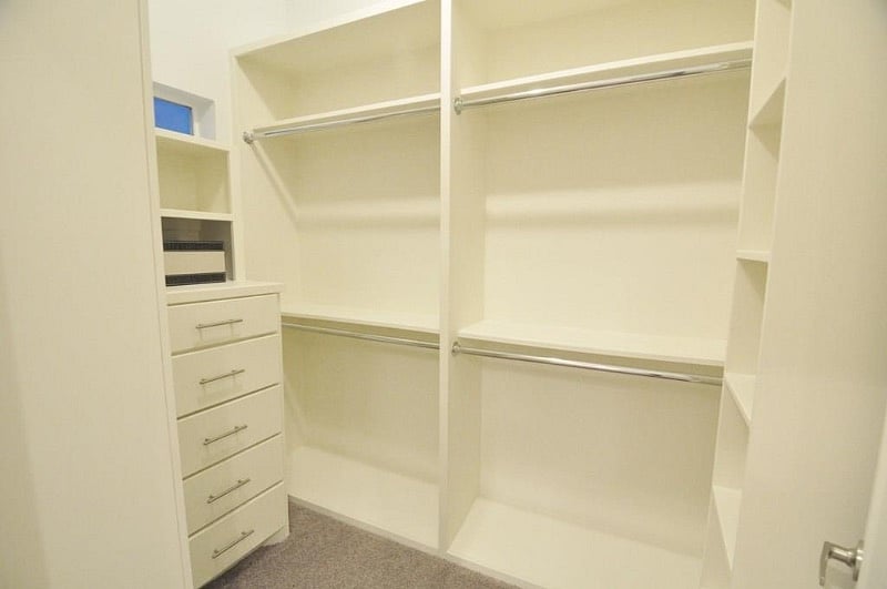Separate His and Hers closets in the master bedroom suite.