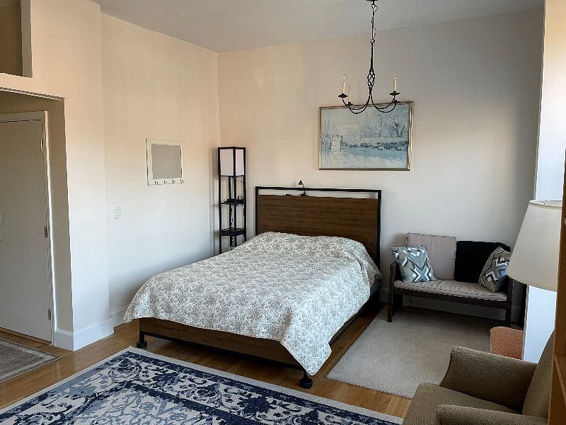 Large rear bedroom opening onto deck