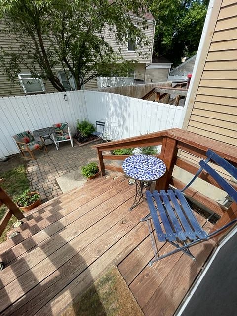Deck from the backdoor with sitting area.