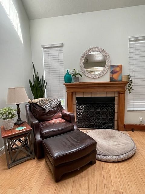 Sitting area with wood burning fire place.