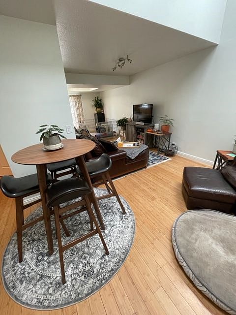 Bar top table with stools. I keep a lot of plants in the home because I love how they make the space feel.