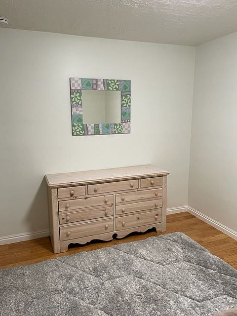Dresser and mirror in bedroom
