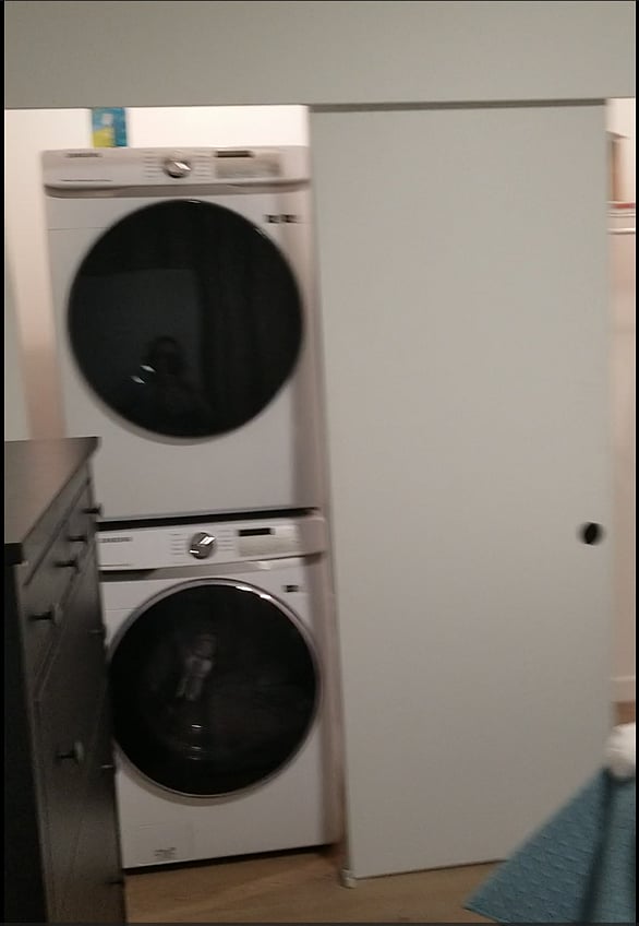 Full size washer & dryer in bedroom closet