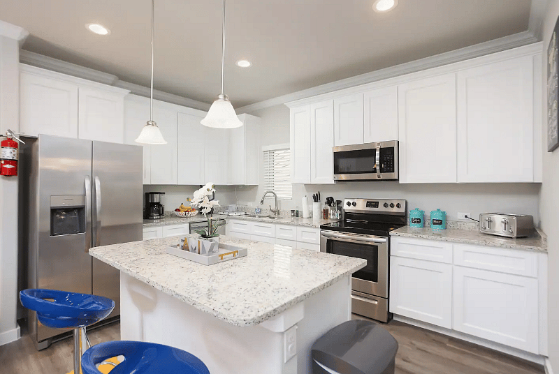 Shared full kitchen with plenty of amenities.