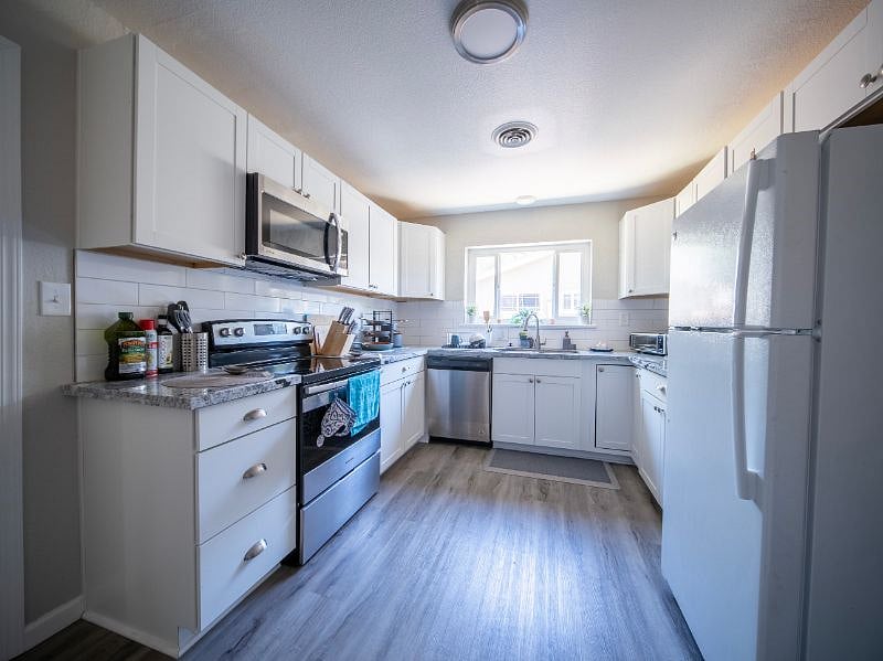 Electric Stove, microwave, and dishwasher