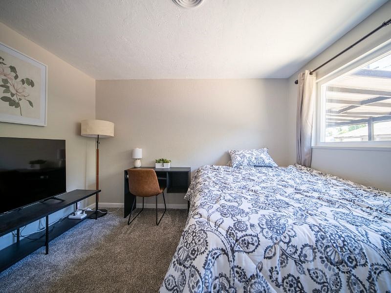 55" 4K Roku Smart TV, writing desk, Queen size memory foam mattress, black out curtains, full length mirror