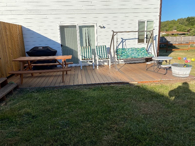 There's a new BBQ, picnic table and deck