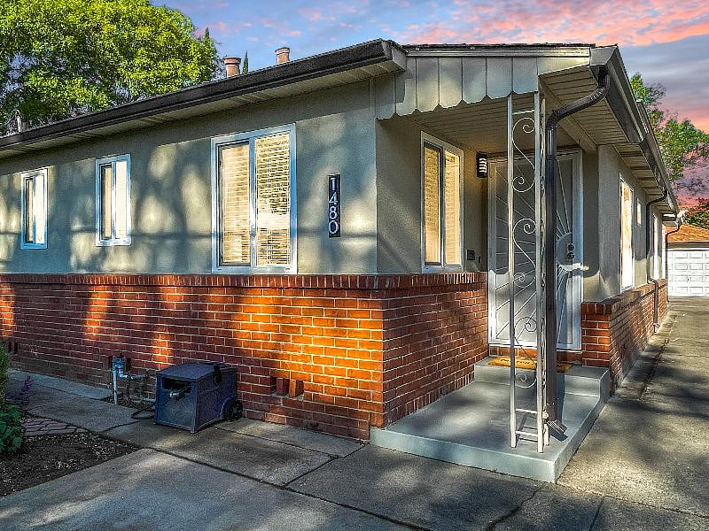 Front porch with separate private entrance. 