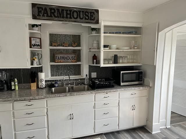 Dishes, pots, pans, and utensils are all provided.
