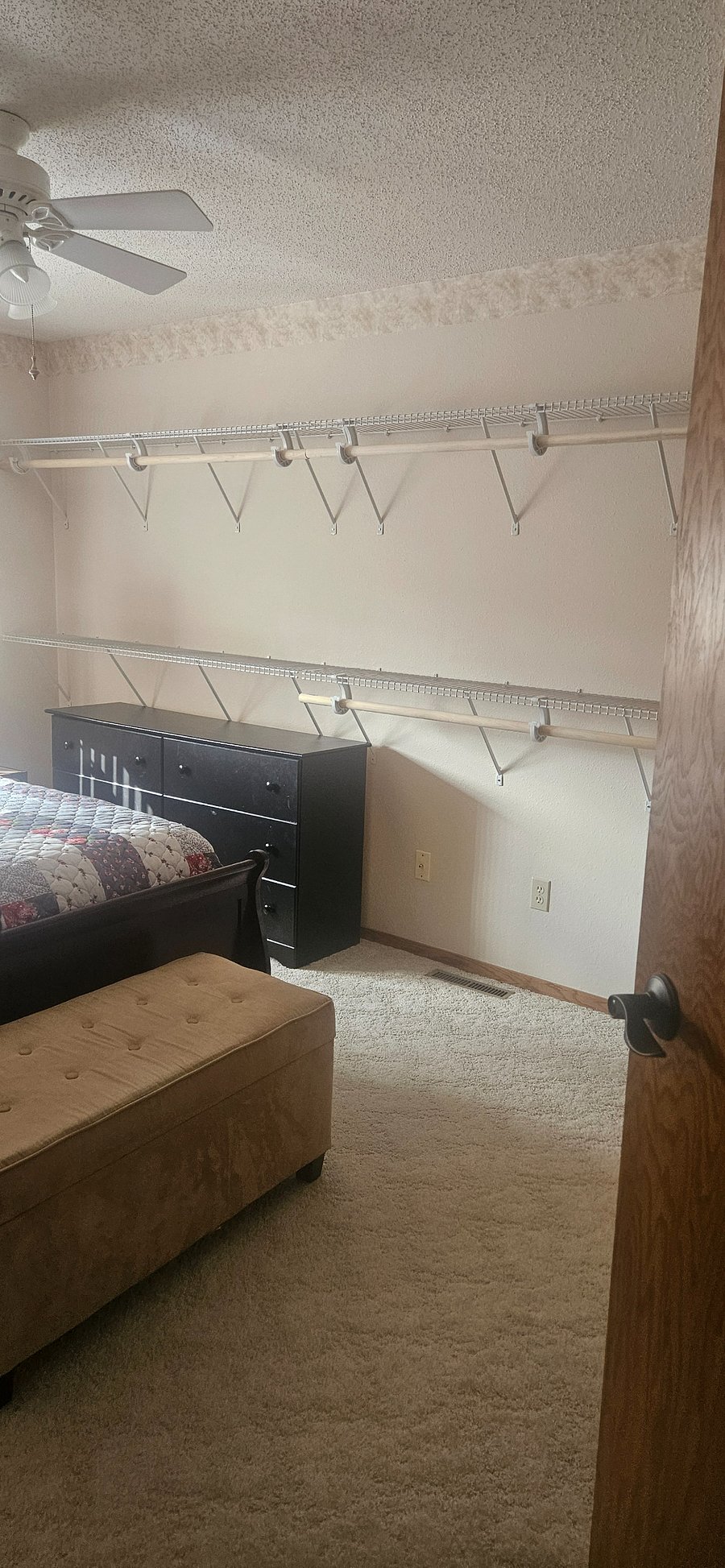 Upper level bedroom
dresser and clothing racks