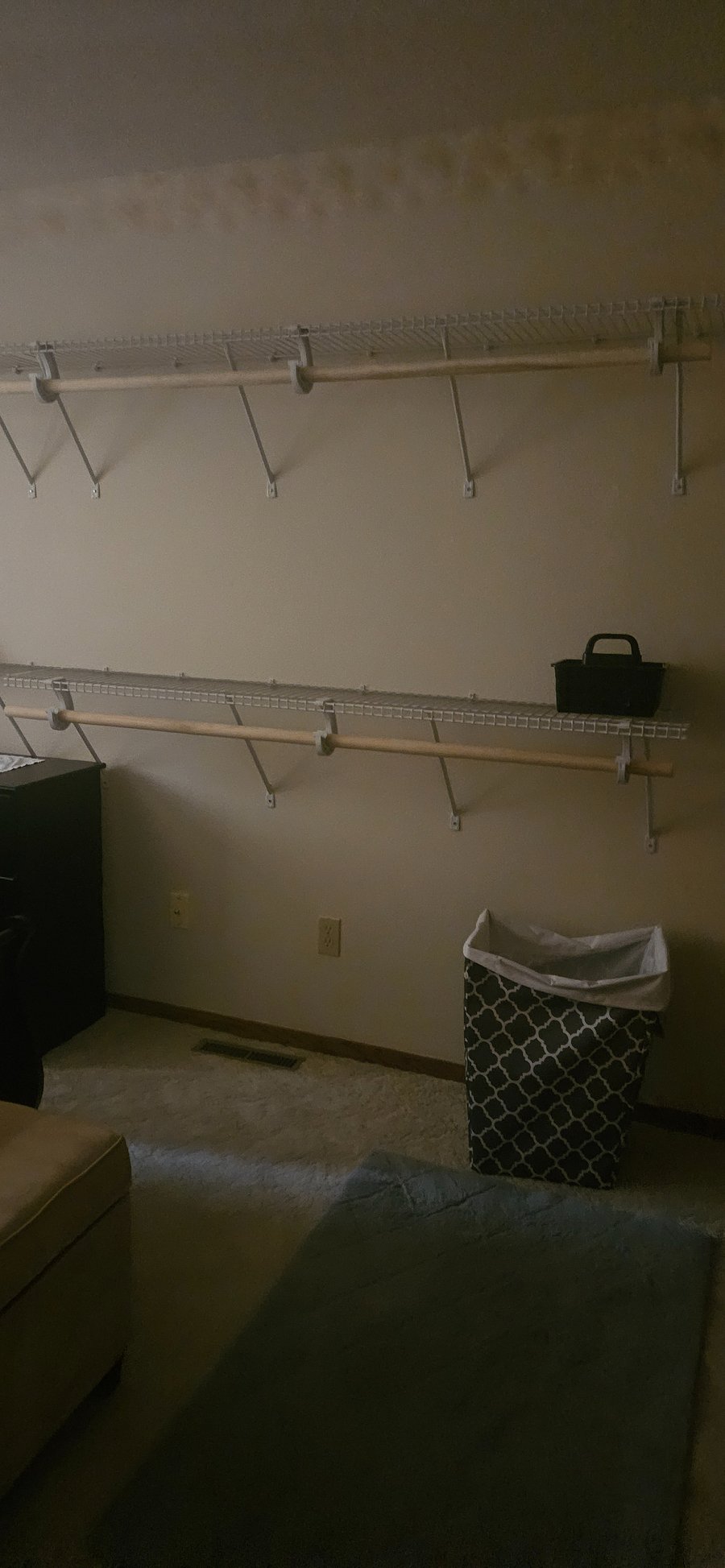 Bedroom Upper level will to wall clothing racks