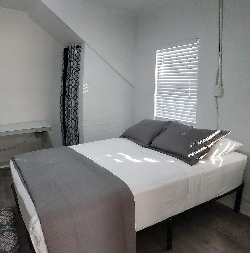 Apt No. 2: One of two bedrooms. Both with high-end queen size bedding.