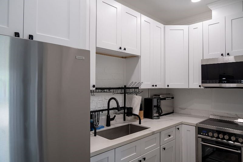 Apt. No. 2: Full galley kitchen all new appliances. Ninja toaster oven. Fully vented stove...Cooking utensils