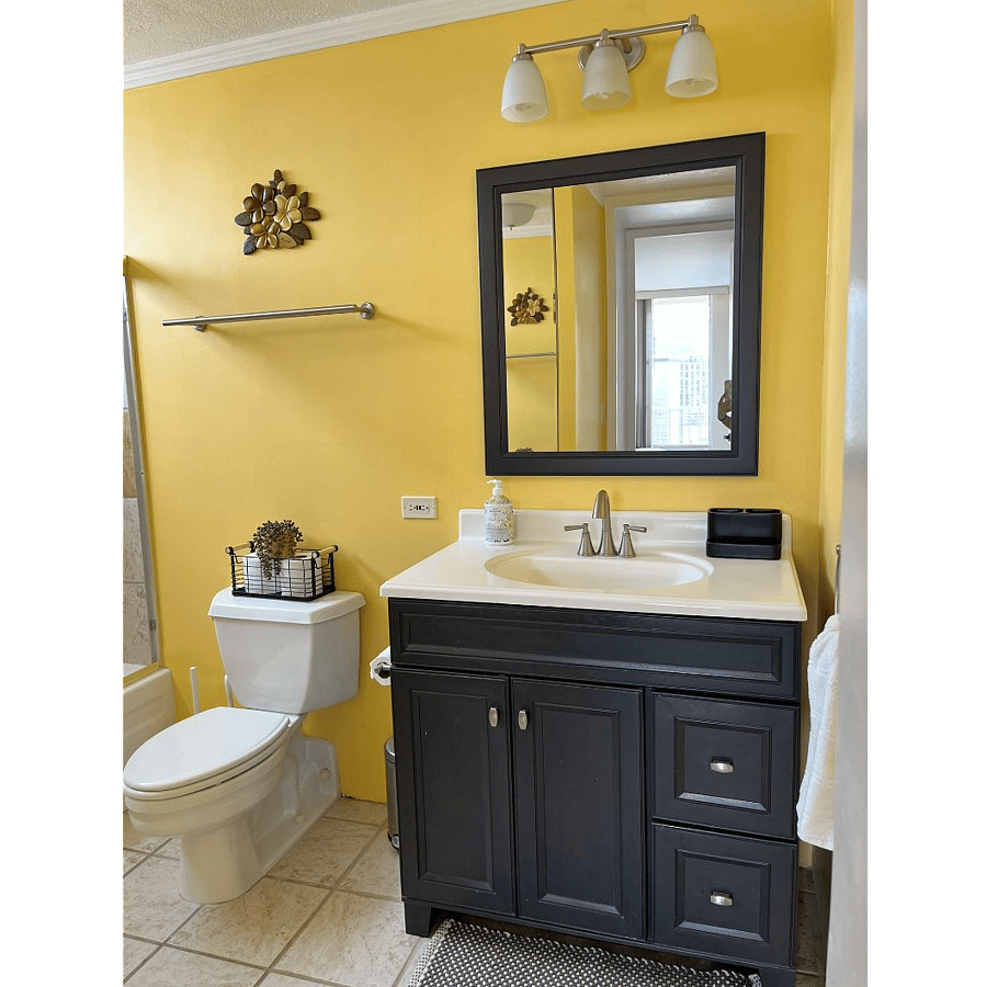 Bright sunny yellow bathroom