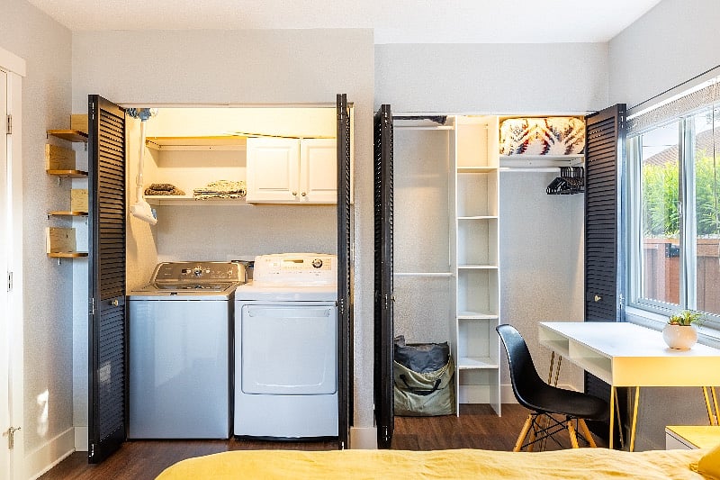Washer, dryer with storage above. Closet with extra storage.