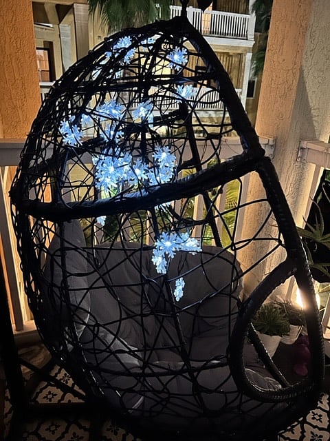 Egg chair at pool view private balcony .