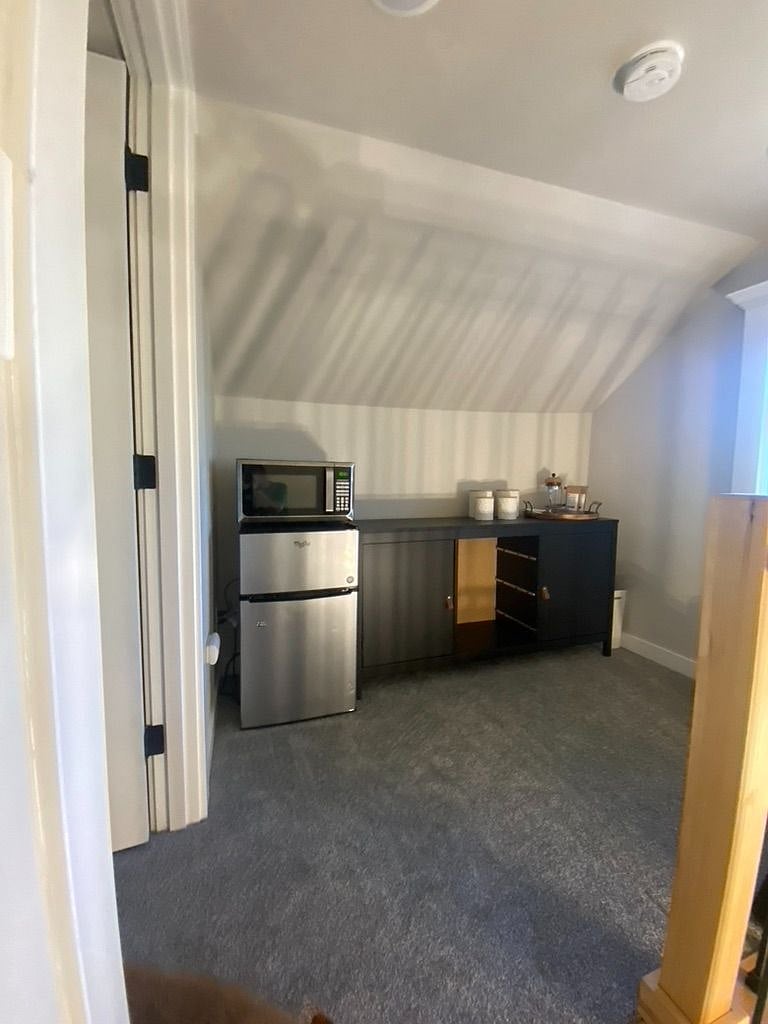 Landing with Keurig coffee station (not in photo but there), microwave, fridge/freezer.