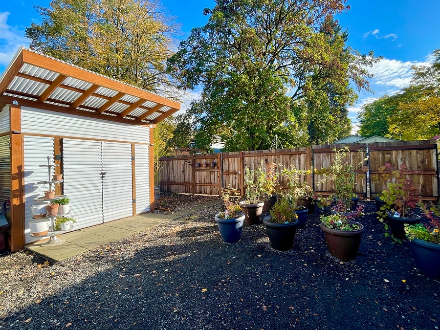 From the driveway you enter first into the vegetable garden. Passing thru owner's garden