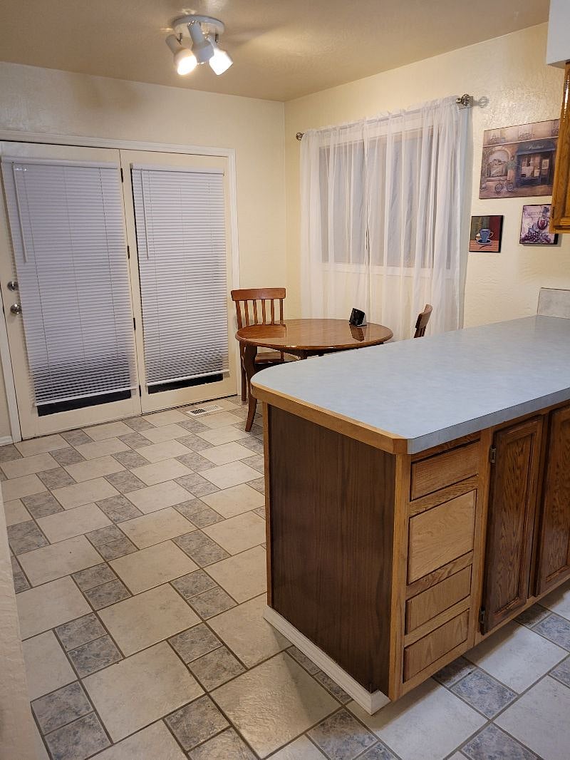 French door exits to the back deck and fenced yard.