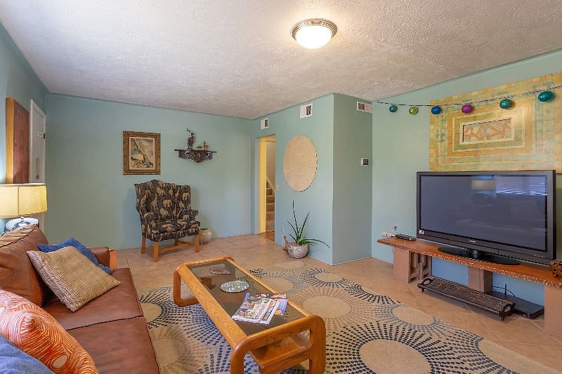 Our relaxing and cozy living room is a great place to relax, watch TV or work on your laptop. Note: The living room sofa also has a built-in bed.