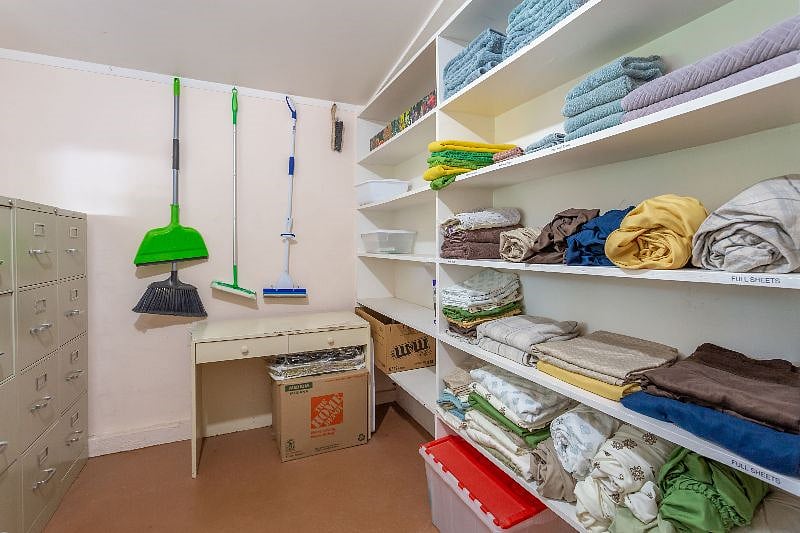 There's plenty of bedding and towels and an extra pad for the sleeper sofa in the living room.