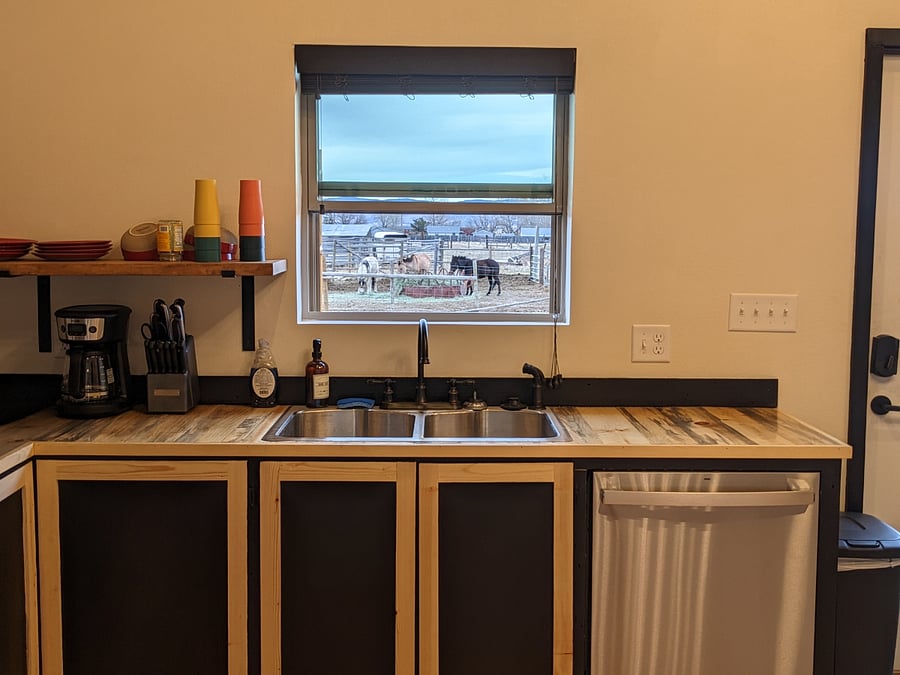 Kitchen area looking out to horse corral