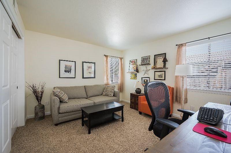 Bedroom #3. currently serves as home office with sleeper sofa. Will change out to queen size bed on request. Double closet and ample natural light.