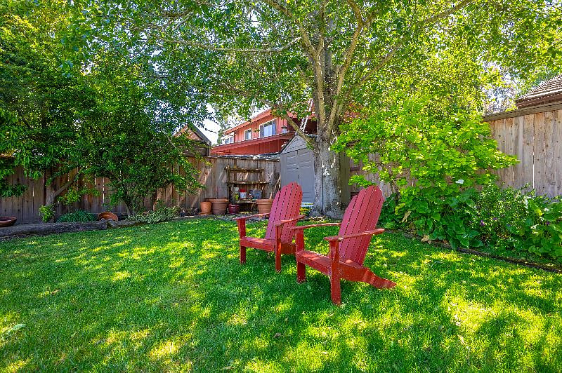 Backyard seating area with mountain view. Perfect spot to decompress after work.