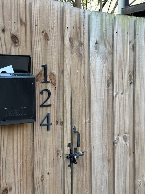 your side entrance down the driveway with your won mailbox..