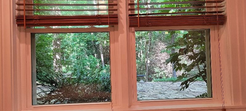 view from bed to beautiful outdoor area