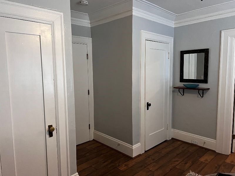Plenty of storage and high ceilings with crown molding