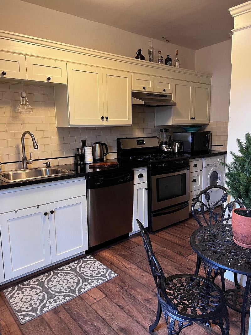 Well stocked kitchen with gas stove
