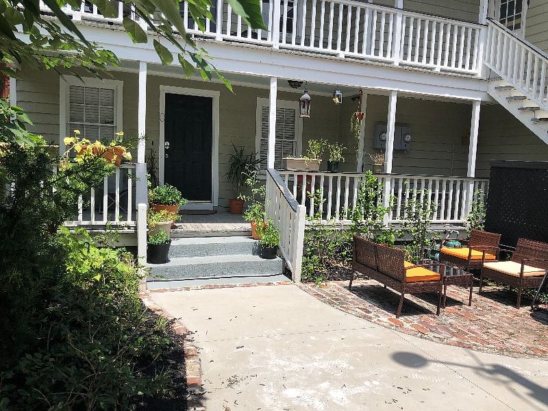 shared patio, unit is at the top of the stairs