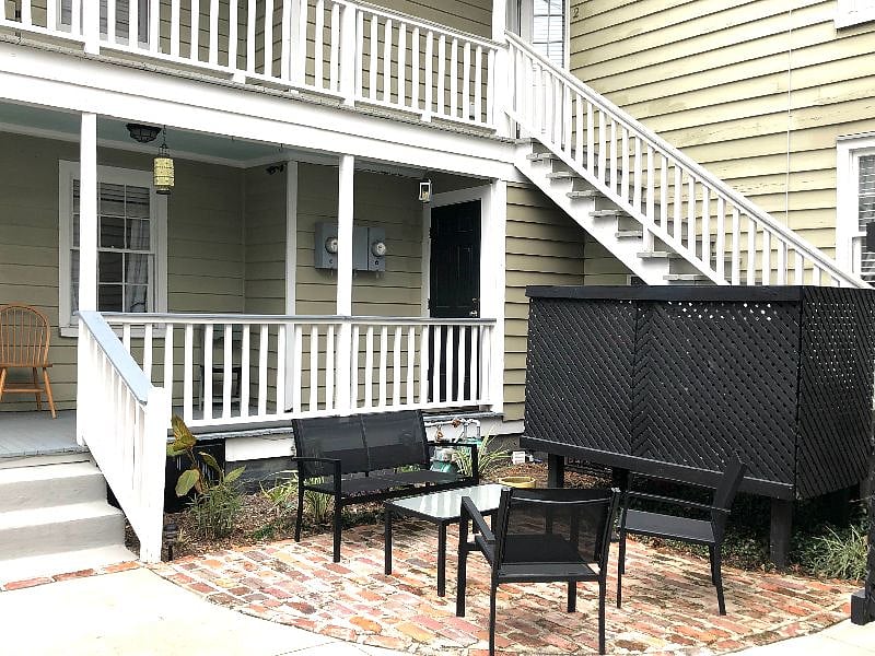 shared patio, unit is at the top of the stairs