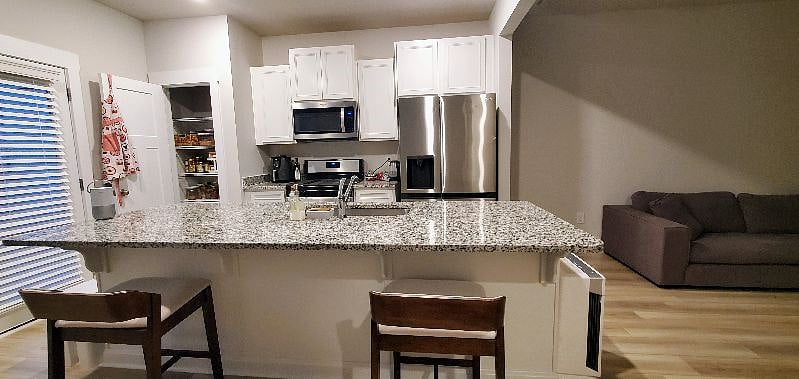 Clean kitchen with all needed an working appliances.