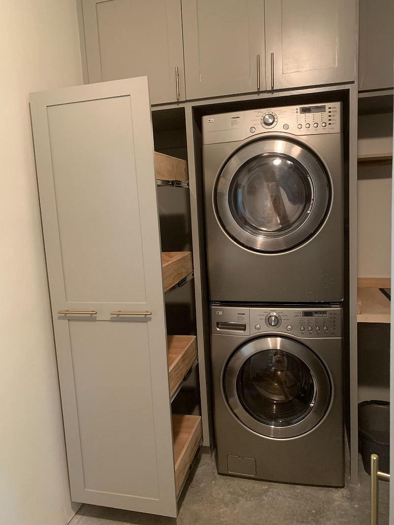 Front loader washer and drying in attached laundry room.  Laundry room has a doggie shower as well with stairs!