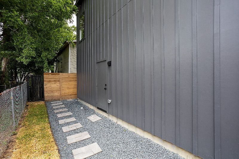 Small fully fenced side yard for your furry friends!
