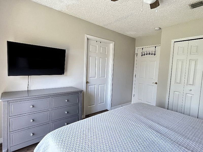 master bed with TV