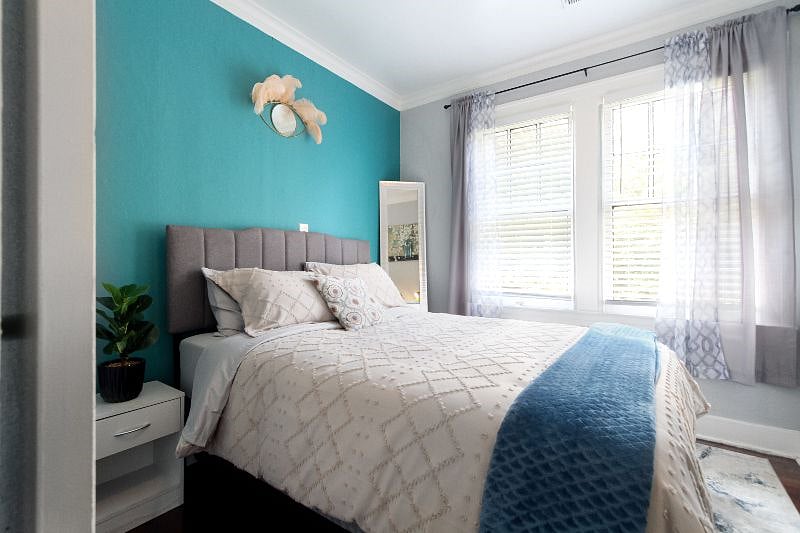 Cozy bedroom with spacious closet and dedicated workspace