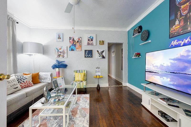 LIVING ROOM features 58 inches smart TV and a sleeper sofa that converts to a queen size bed if you have extra visitors. Sit back, relax, and enjoy a charming ambiance