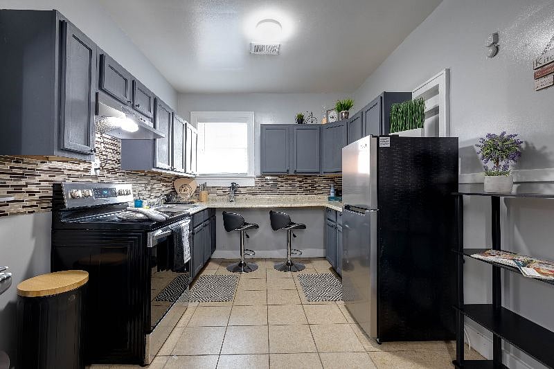 Fully equipped kitchen with brand new stainless steel appliances to whip yummy home-cooked dishes